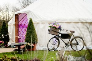 Small yurt with bicycle, rustic styling