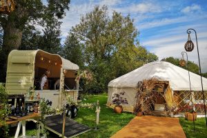22ft yurt hire at Yorkshire Yurts Open Day, Autumn 2019, bohemian florals and outdoor bar, shepherd crooks and walkway