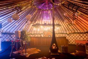 33ft yurt at yurtbar with wood burning stove and apre ski themed and christmas decorations