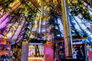 25ft yurt with wood burning stove, Christmas decorations and apres ski, neon sign