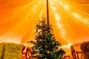 small marquee with Christmas tree at YurtBar